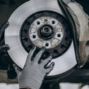 mechanic changing brake discs car service